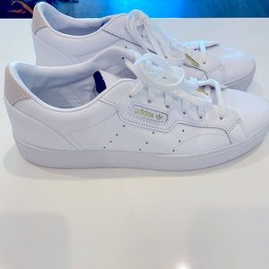 Women’s white Adidas sneakers - size 10
